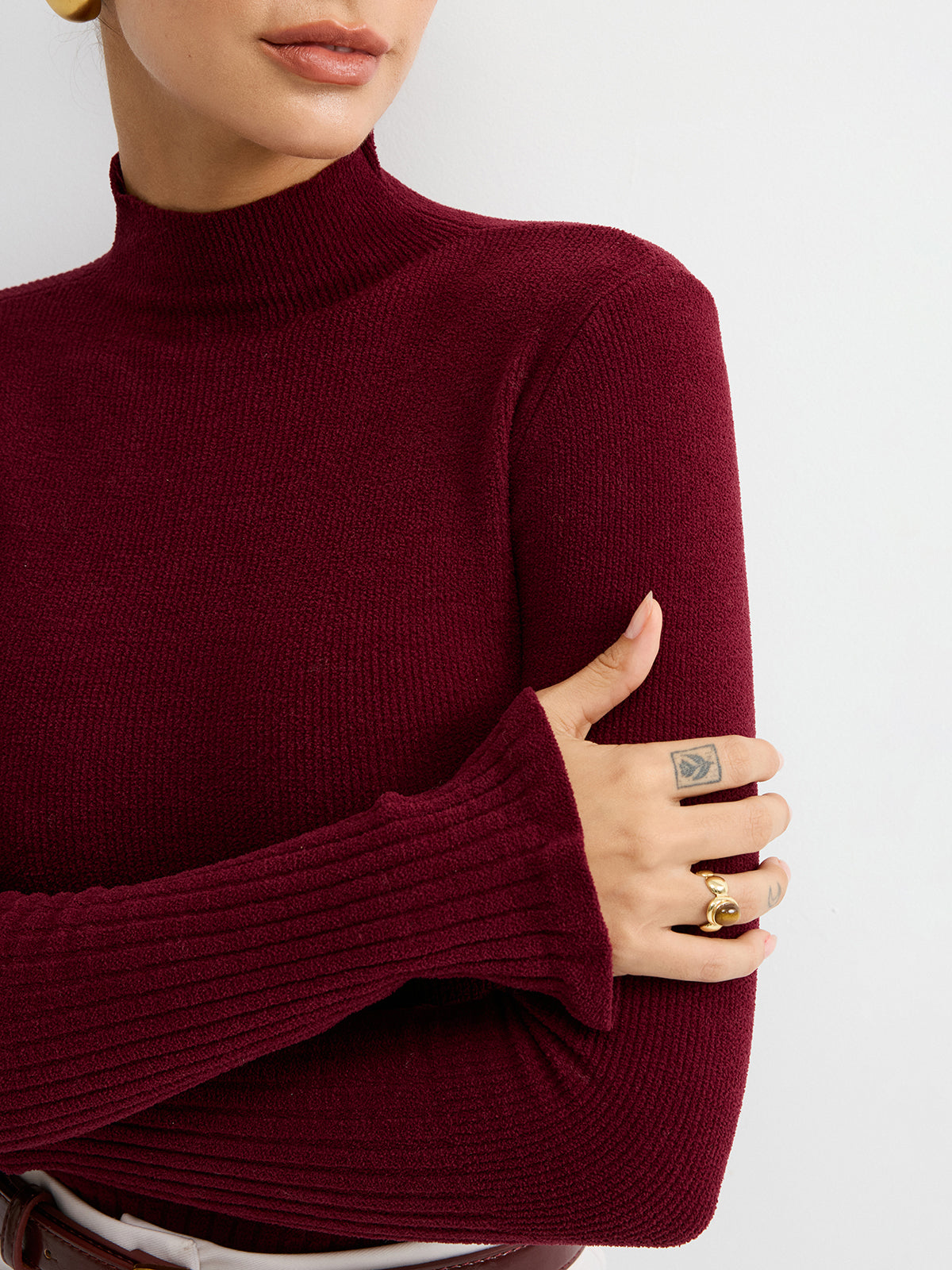 Dopasowany prążkowany top z golfem