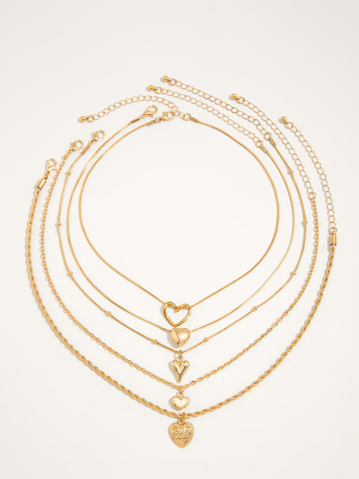 Naszyjnik wielowarstwowy z zawieszkami serca