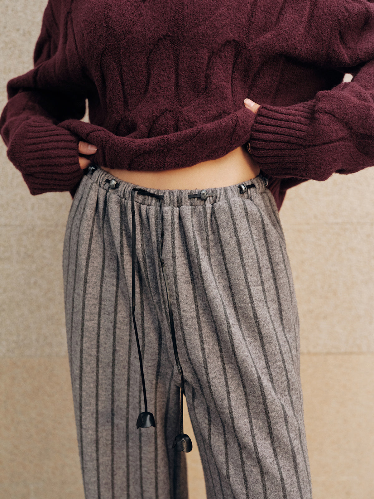 Spodnie damskie z szerokimi nogawkami w paski