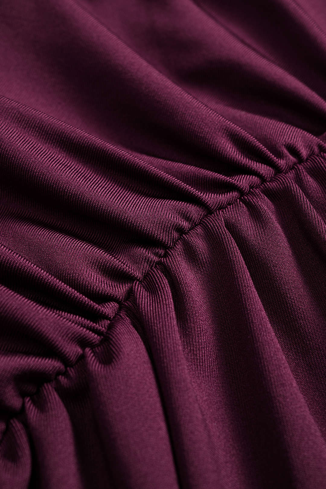 Sukienka asymetryczna z drapowanym detalem