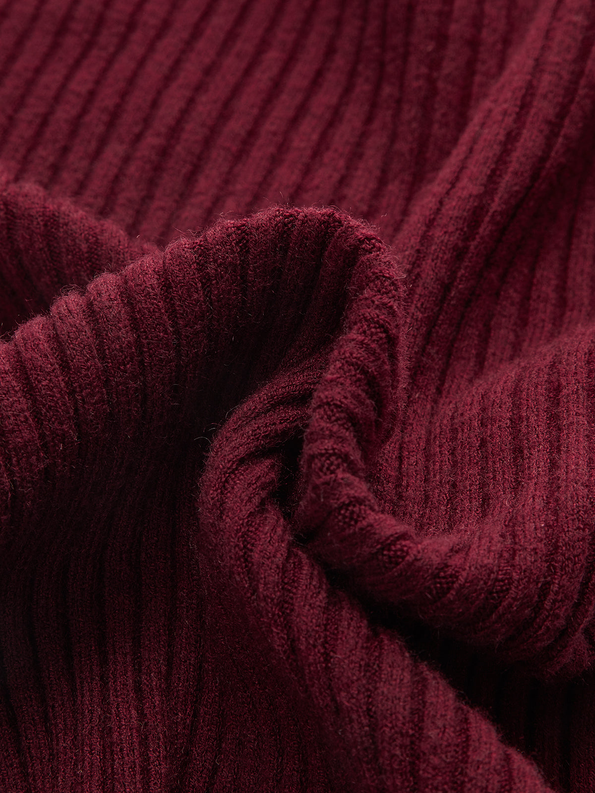 Sweter asymetryczny z ozdobnym zamkiem na ramieniu