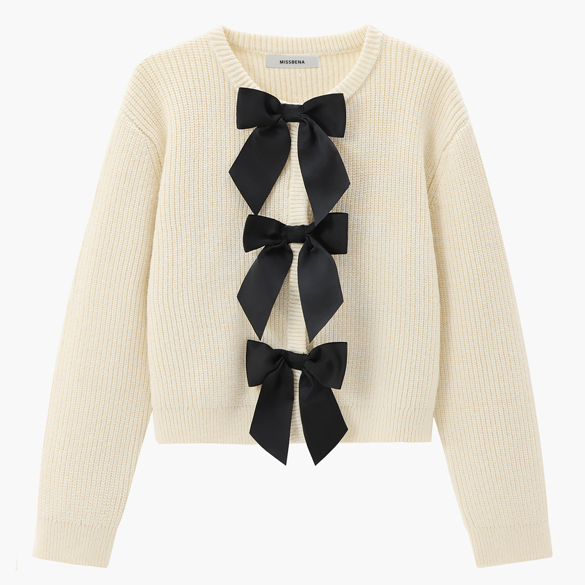 Sweter z ozdobnymi kokardami na przodzie