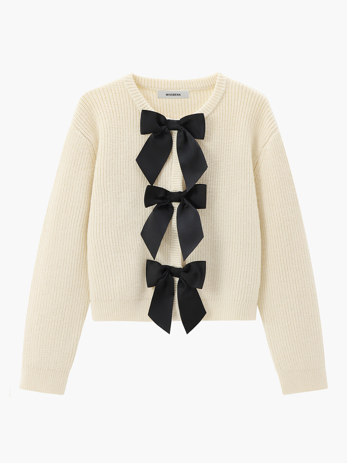 Sweter z ozdobnymi kokardami na przodzie